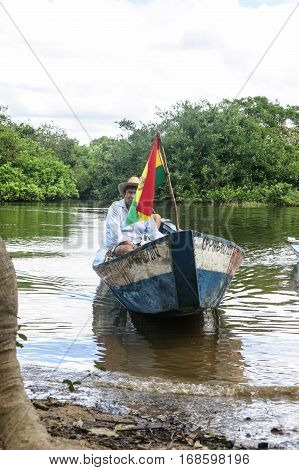 Madidi river - MAY 5: Instant of a boat with people sailing in the river on May 5 2015 in Beni Region Bolivia. The rivers are the main roads in the Amazon jungle.