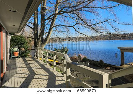 Large Spacious Deck Of Grey Waterfront Home