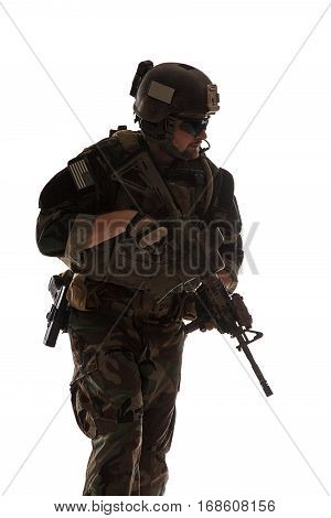 United states Marine Corps special operations command Marsoc raider with weapon. Studio shot of Marine Special Operator white backgroun