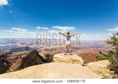 Female tourist look at Grand Canyon landscape
