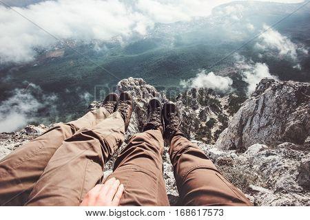 Couple Feet selfie on mountains cliff aerial view relaxing Travel Lifestyle adventure vacations concept into the wild