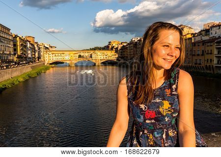 Girl In Front Of The Ponte Vecchio In Florence, Italy In Summer 2016