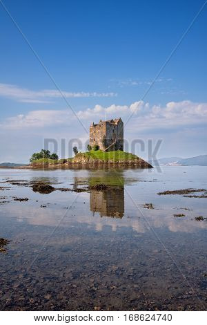 Castle Stalker, Appin, Argyll, Scotland is a well-preserved medieval tower-house situated on a tidal islet on Loch Laich. Founded around 1440 the castle has variously been associated with the Clans of MacDougall, Stewart and Campbell.