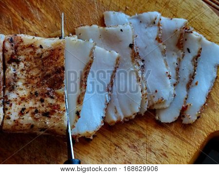 Homemade lard with condiments. Natural food, appetizer. Closeup. Traditional Dishes of Russian Cuisine