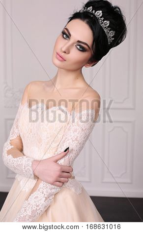 Gorgeous Bride With Dark Hair In Luxuious Wedding Dress