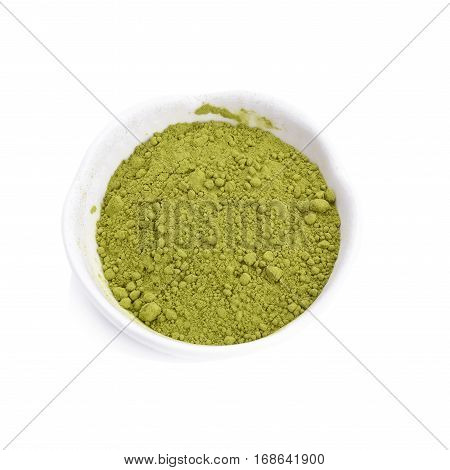 Green Tea powder on the plate on white background