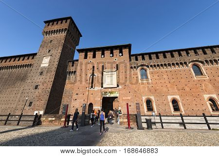 MILAN ITALY - SEPTEMBER 24 2016: People visiting the Sforza Castle XV century (Castello Sforzesco). It is one of the main symbols of the city of Milan Lombardy Italy