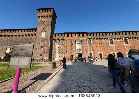 MILAN ITALY - SEPTEMBER 24 2016: People visiting the Sforza Castle XV century (Castello Sforzesco). It is one of the main symbols of the city of Milan Lombardy Italy