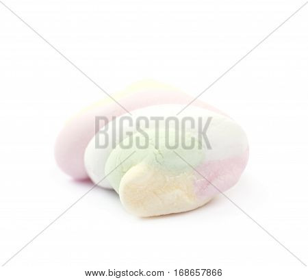 Single piece of marshmallow candy isolated over the white background