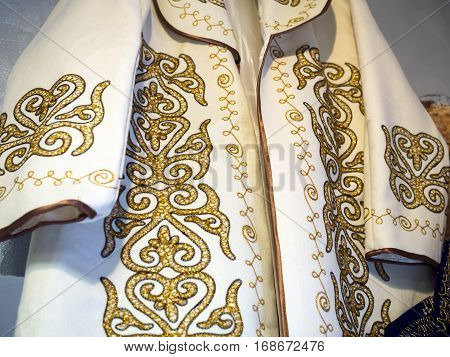 The embroidered pattern on the national Kazakh a bathrobe