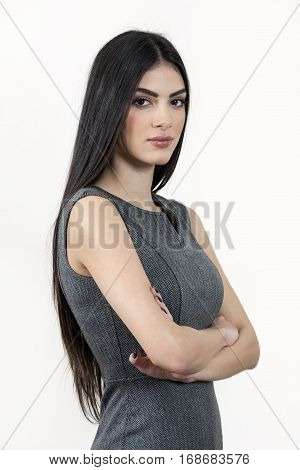 Young Business Woman Standing With Arms Crossed.