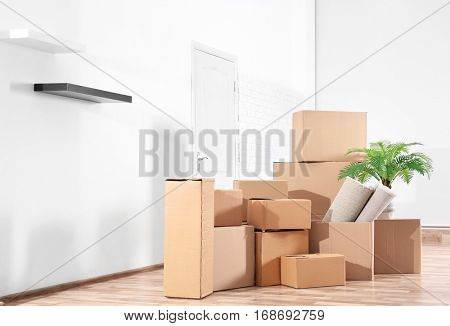 Pile of boxes for moving in office
