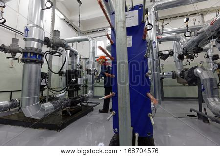 ST. PETERSBURG, RUSSIA - DECEMBER 16, 2016: Operator in one of the central heating points. There is 219 central heating points in the city, 60 of which is automated