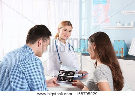Future parent with doctor at the hospital