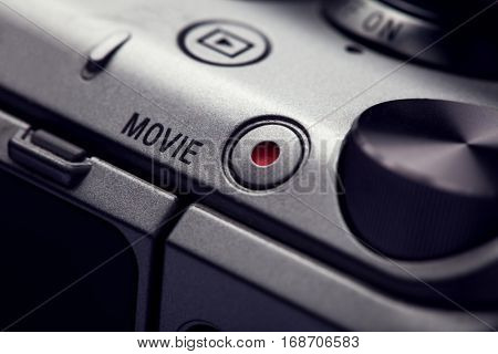 movie play button on the body of modern audio-video devices