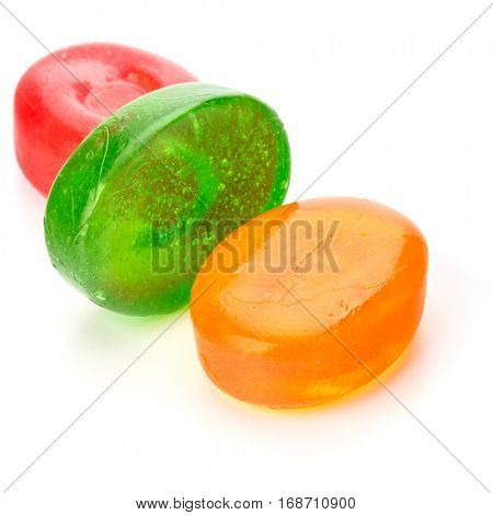 Three colorful fruit hard sugar candies,  boiled sweeties or sugar plums isolated on white background cutout.