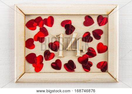 Calendar For 14 February On Wooden Background With Empty Copy Space  Inscription Or Other Objects.