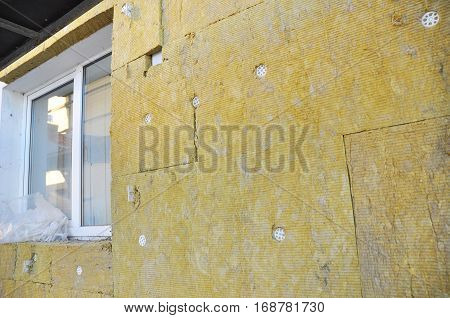 Windows Area External Wall Insulation with Fiberglass.