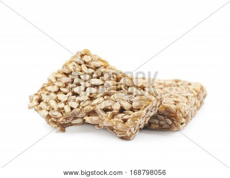 Two pieces of gozinaki confection sweets isolated over the white background