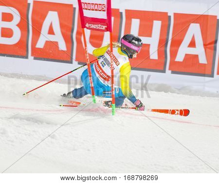 STOCKHOLM SWEDEN - JAN 31 2017: Side view of figting Frida Hansdotter (SWE) in the parallel slalom downhill skiing at the Alpine Audi FIS Ski World Cup - city event January 31 2017 Stockholm Sweden