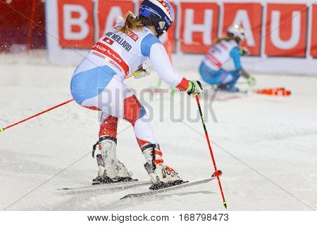 STOCKHOLM SWEDEN - JAN 31 2017: Side view of Melanie Meillard (SUI) and competiotor in the downhill skiing in the parallel slalom alpine event Audi FIS Ski World Cup. January 31 2017 Stockholm Sweden