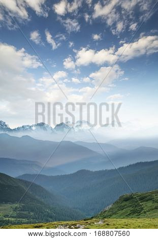 Hills during sunrise in mountain valley. Beautisul natural landscape