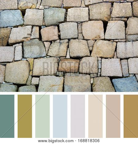Background of colourful stone blocks In a colour palette with complimentary colour swatches.