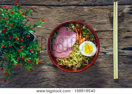 Ramen Noodles With Vegetables Egg Ham On Old Rustic Wooden Background Vintage Style.