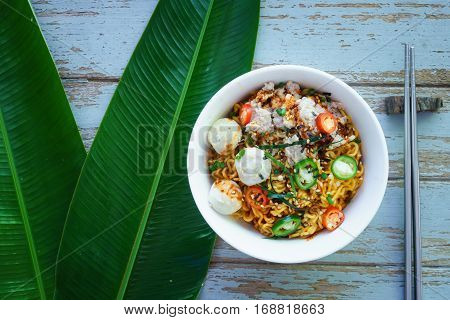 Ramen Noodles With Vegetables Egg Ham On Old Rustic Wooden Background Vintage Style.