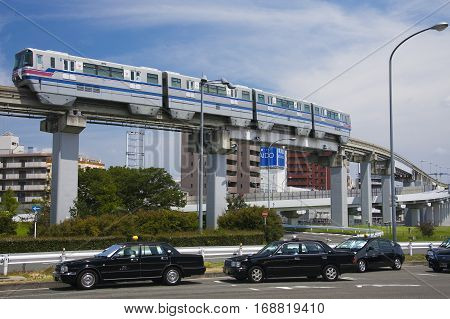 Osaka, Japan - Aug 10, 2015: Osaka Monorail And Taxi Near The Osaka International Airport