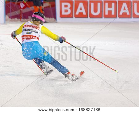 STOCKHOLM SWEDEN - JAN 31 2017: Rear view of Frida Hansdotter (SWE) in the parallel slalom downhill skiing at the Alpine Audi FIS Ski World Cup - city event January 31 2017 Stockholm Sweden