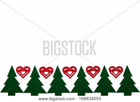 ornament with figurines of christmas tree and hearts made of felt horizpntal background with copy space. flat lay.