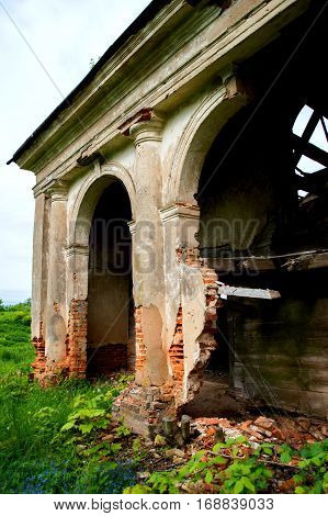 Old ruined classical arches in the building.