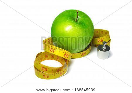 Green apple isolated on white background with a ruler