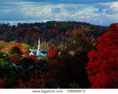 Fall colors and a white church steeple
