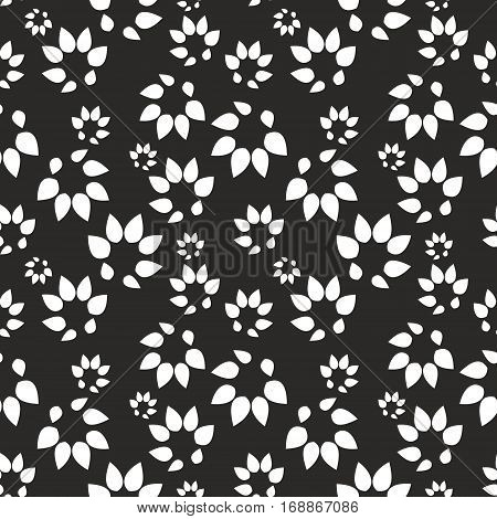Abstract black background with stylized leaves. Vector seamless pattern for design