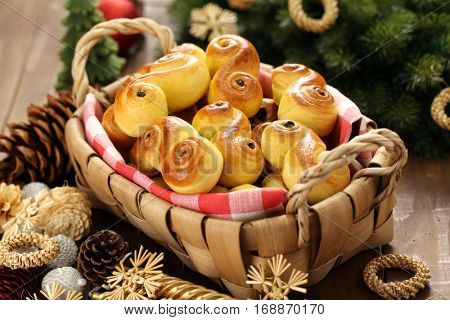 homemade swedish saffron buns, lussekatt in basket