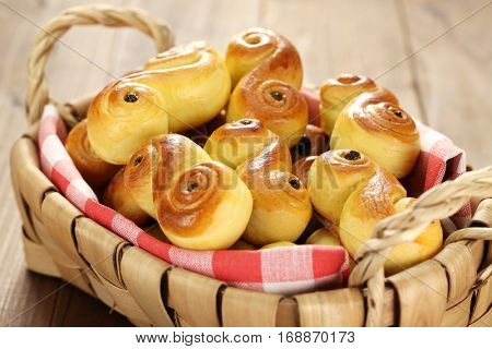 homemade swedish saffron buns, lussekatt in basket
