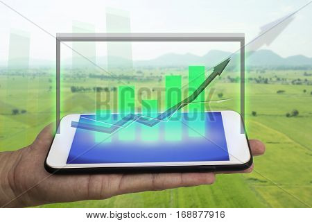 iot internet of things agriculture concept smart farming farmer use augmented reality to predictforecastestimate a growth of yield worker machinemoney etc in the farm or field