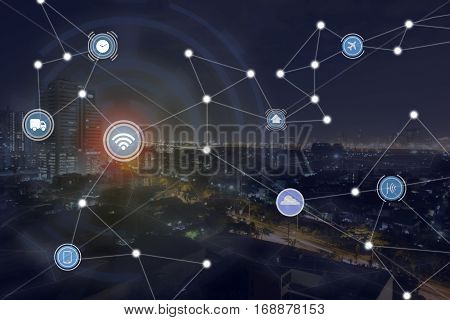 iot internet of things smart city concept and wireless mesh communication network with a night city background