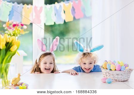 Kids With Bunny Ears On Easter Egg Hunt