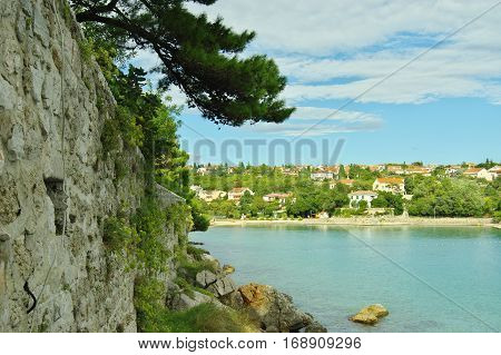 Krk Croatia: a town in the south of the island of Krk. It is a tourist resort in old town there are preserved fragments of buildings from Roman times. Defensive walls of the Frankopanski Castle.