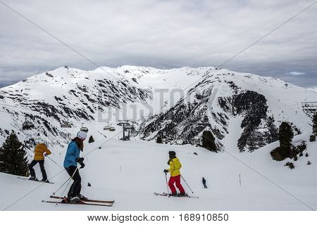 HINTERTUX, AUSTRIA - MARCH 29, 2015: Group of people waiting prior downhill skiing on a piste at the Horberg mountain in Tyrol Austria