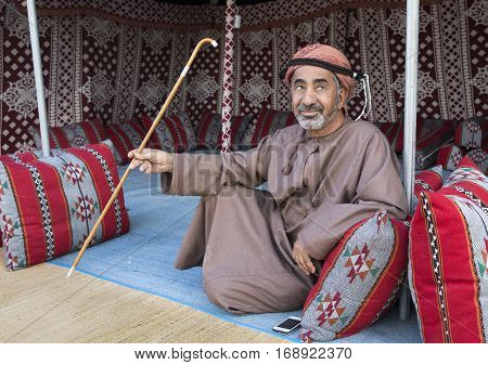 Muscat Oman February 4th 2017: omani man in traditional clothing resting