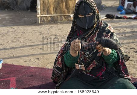 Muscat Oman February 4th 2017: omanya working on making yarn out of wool