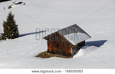 Small wooden hut in the Tuxer Alps on the Rastkogel mountain in Tyrol Austria