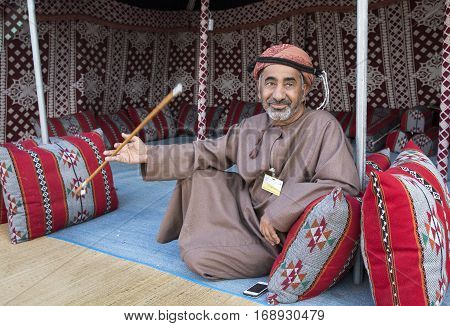 Muscat Oman February 4th 2017: omani man in traditional clothing resting