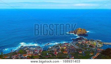 View of the village of Porto Moniz with lava-rock pool Madeira Island Portugal