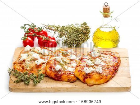 Tris Of Mixed Pizza On Wood  Isolated On White With Ingredients