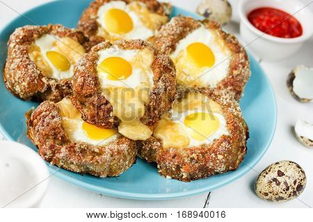 Bird nest Easter recipe - meat nests baked minced meat cutlet stuffed with quail eggs and cheese